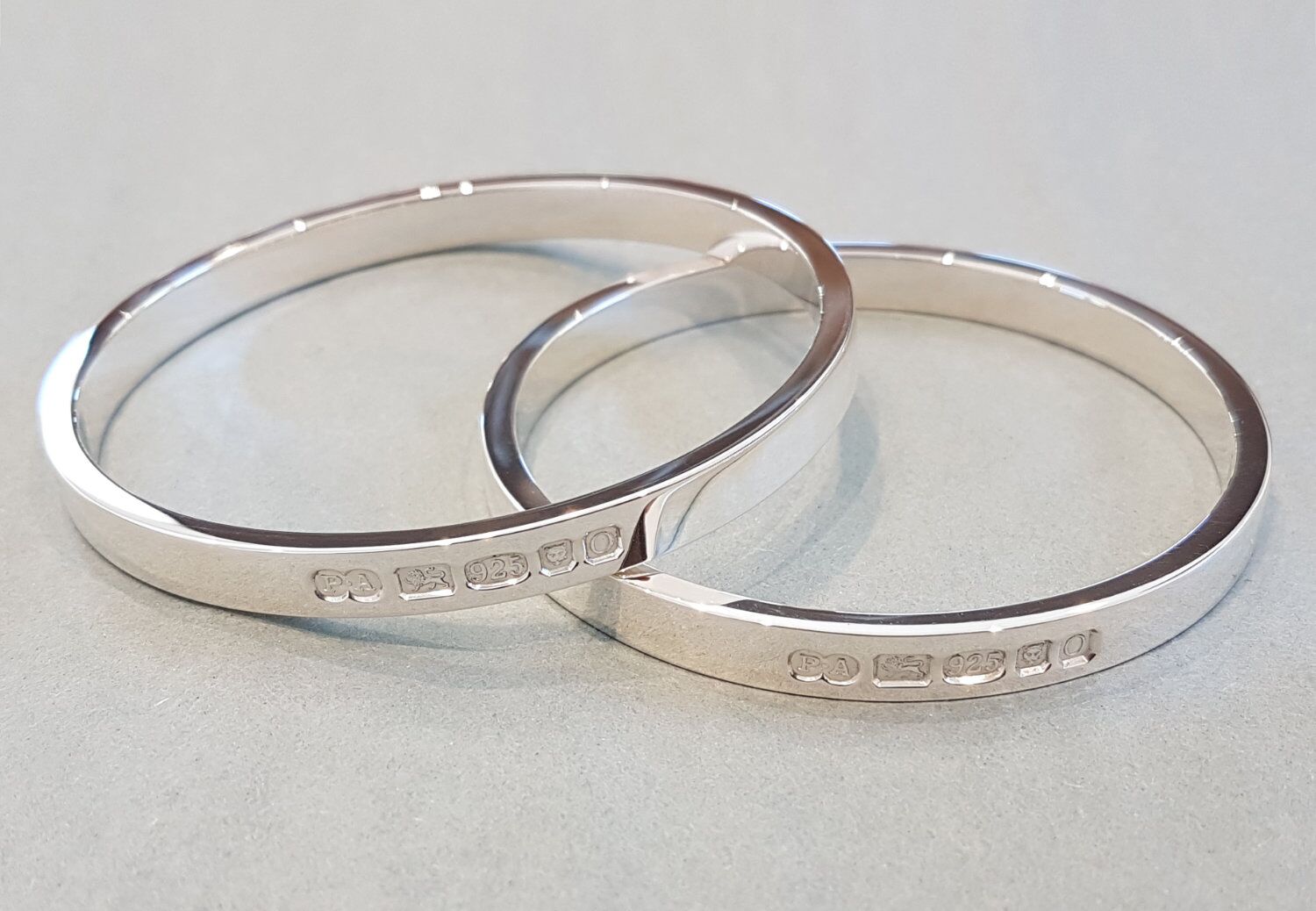 Zennor 6 Heavy Solid Sterling Silver Bangle Outside Hallmarks 2 Zennor 6 Heavy Solid Silver Bangle, Handmade in Cornwall. outside display London Hallmarks - 6mm wide. One Bangle on top of another.