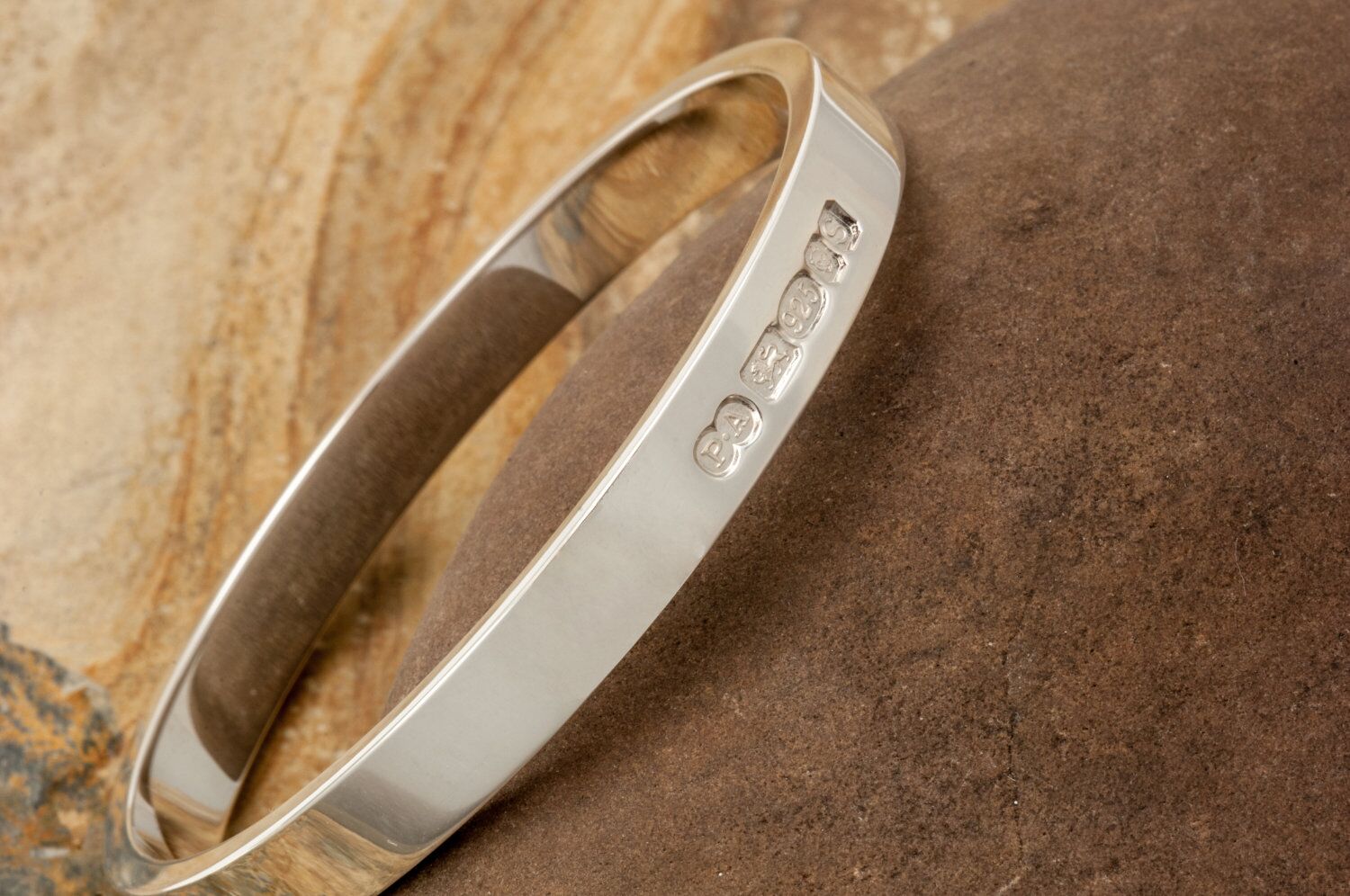 Zennor 8 Chunky Solid Sterling Silver Bangle Outside Hallmarks 3 Zennor 8 Chunky Solid Silver Bangle Bracelet, it is Handmade with outside display London Hallmarks - 8mm wide.