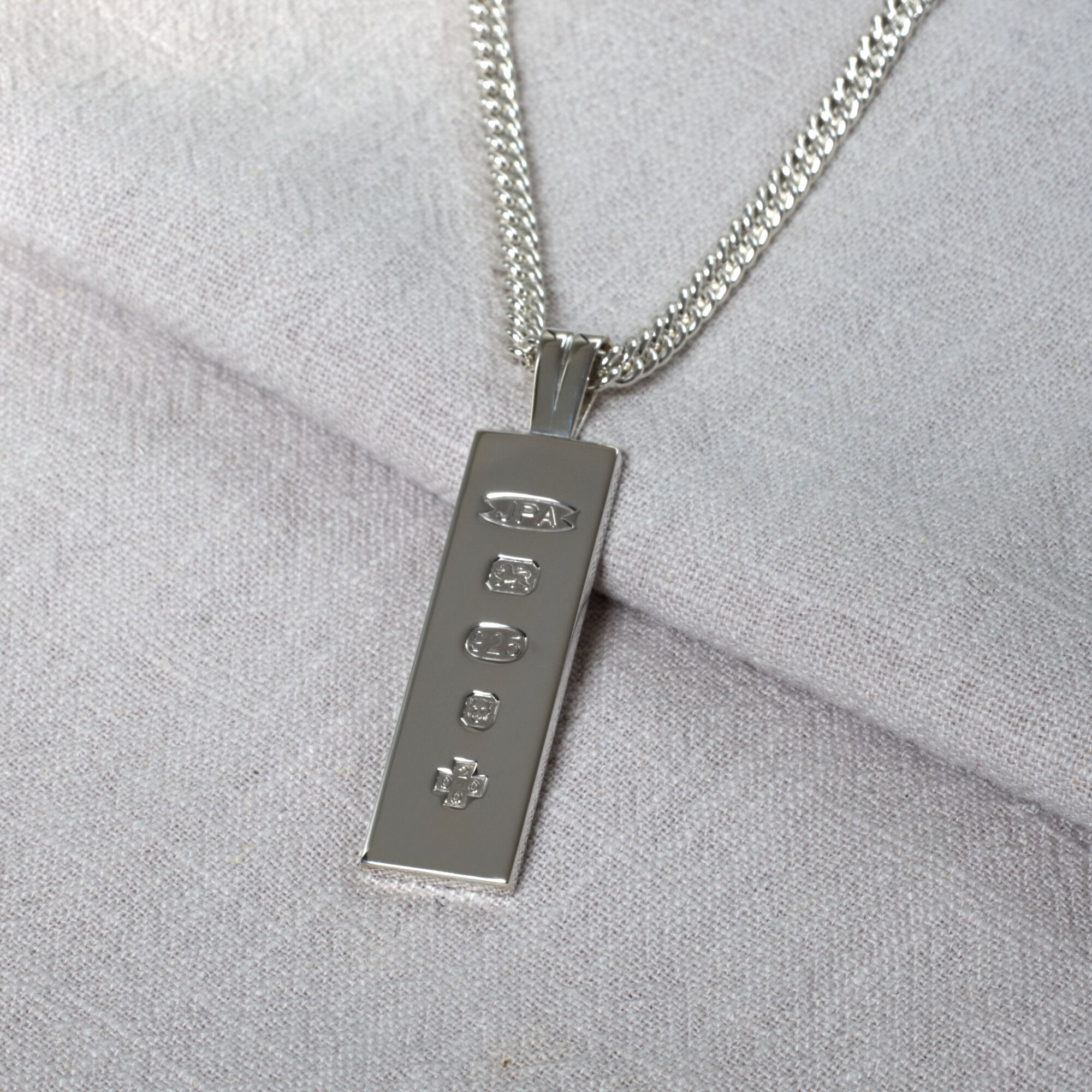 Solid Sterling Silver Millennium Ingot Pendant 3 Large silver ingot pendant for men london hallmarked with millennium hallmark on a silver curb link chain by kerensa jewellery