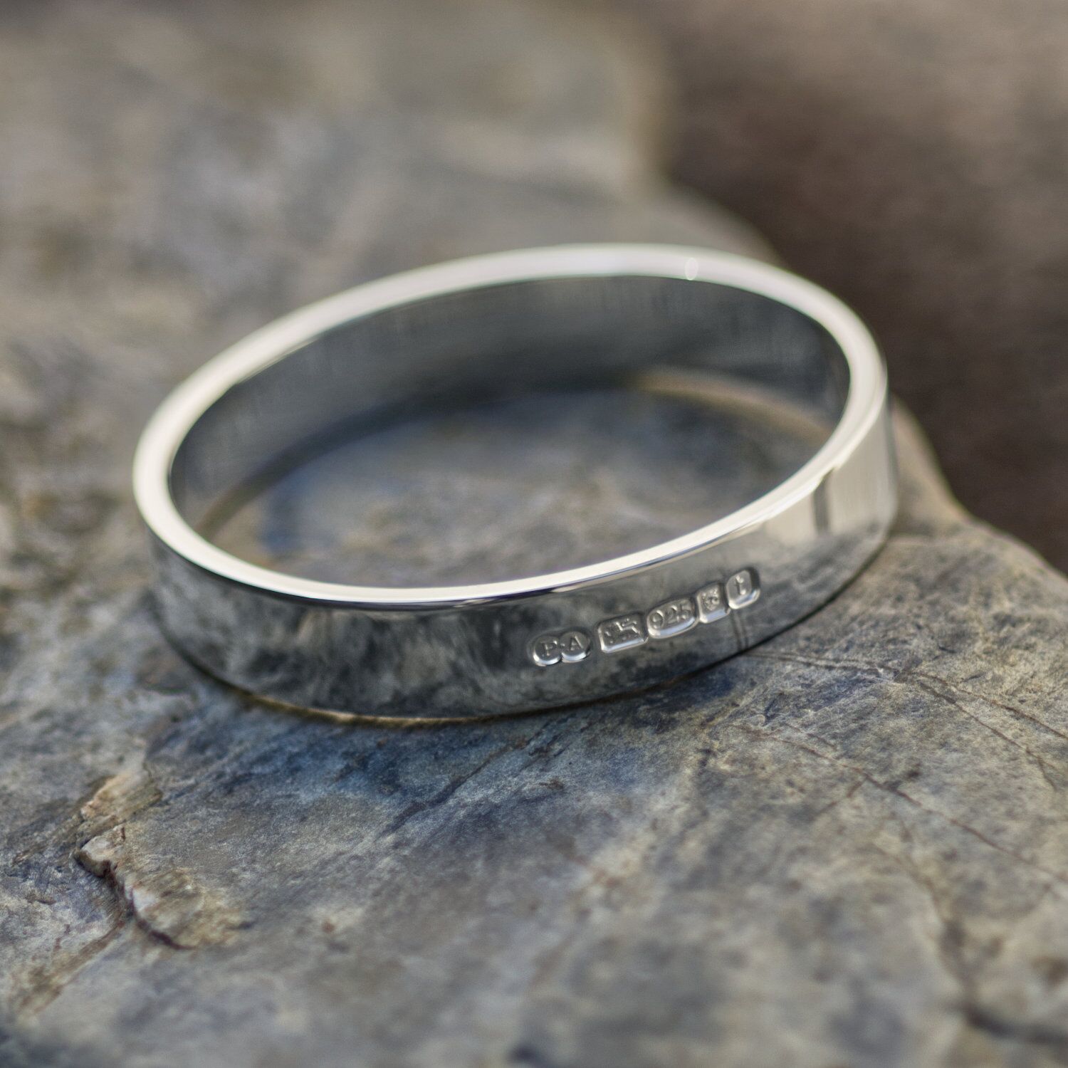 Zennor 12 Extra Heavy Chunky Solid Sterling Silver Bangle 2 Zennor 12 is an Extra Heavy, Chunky Solid Silver Bangle, Handmade in Cornwall. It is a Solid Silver Bracelet with display London Hallmarks - 12mm wide. Polished finish