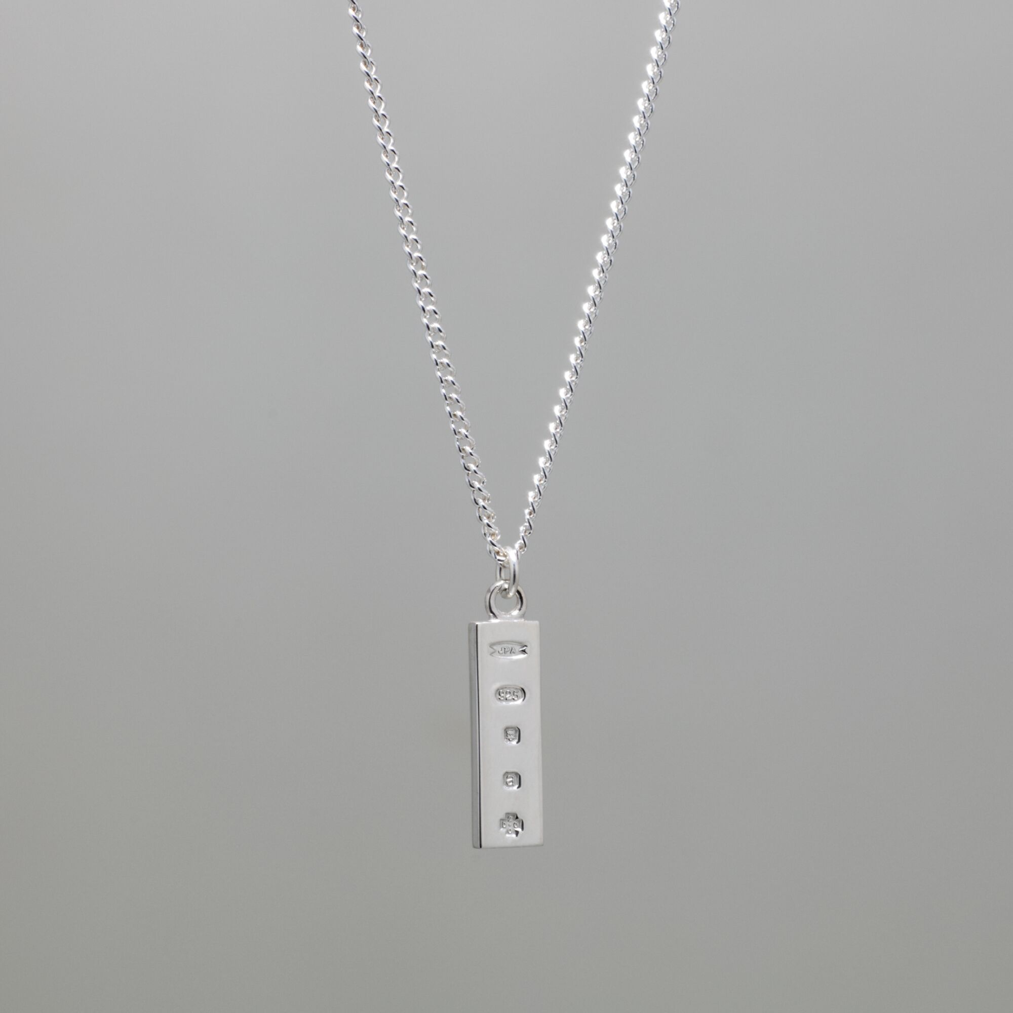 Solid Silver Millennium Ingot Pendant & Chain - Small 3 small silver ingot pendant for men and women, london hallmarked with millennium hallmark on a silver curb link chain by kerensa jewellery