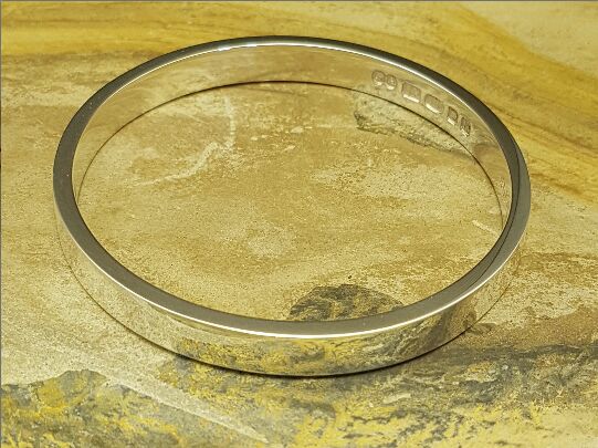 Zennor 8 Chunky Solid Sterling Silver Bangle Inside Hallmarks 4 Zennor 8 Chunky Solid Silver Bangle Bracelet, it is Handmade with outside display London Hallmarks - 8mm wide.