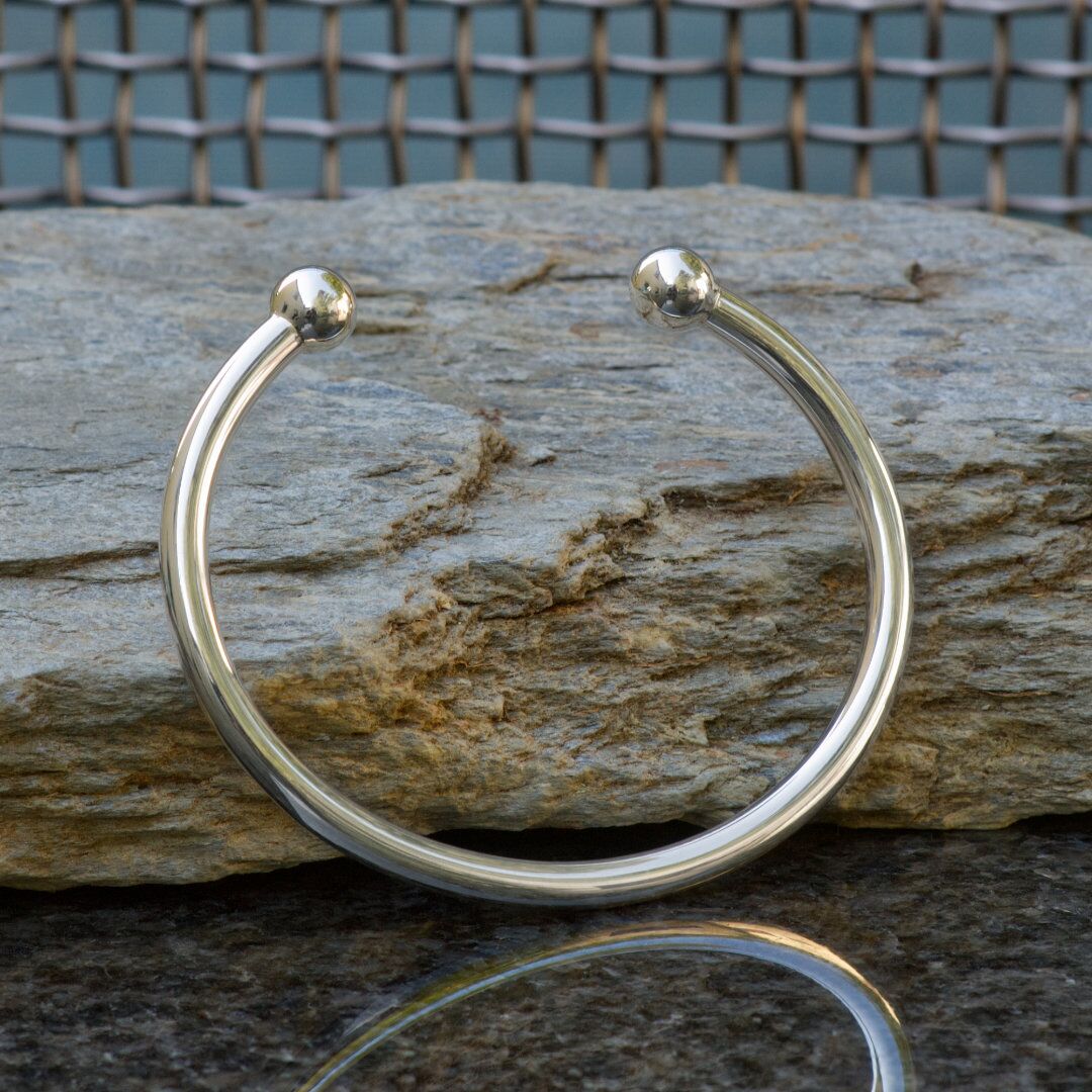 Kynance Cuff Solid Sterling Silver Torque Bangle 4 Kynance Cuff Solid Silver Torque Cuff Bracelet, Handmade In Cornwall with London Hallmarks. 5mm Wide with Solid Silver Balls.