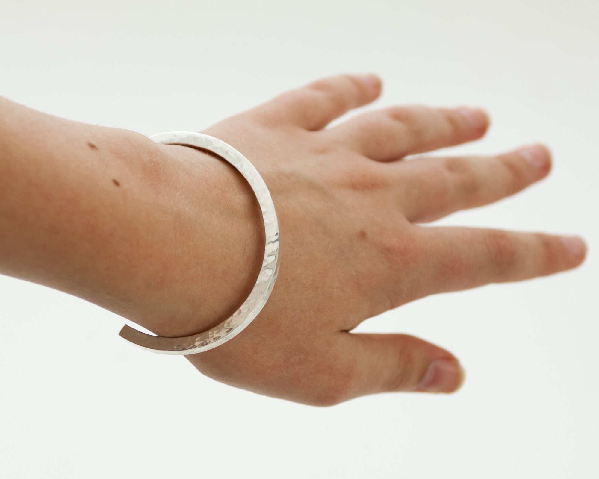 Solid Sterling Silver Hammered Cuff - Newlyn 4 4 Newlyn 4 Highly Polished Solid Sterling Silver Heavy Torque Cuff Bangle with a hammered texture London Hallmarked