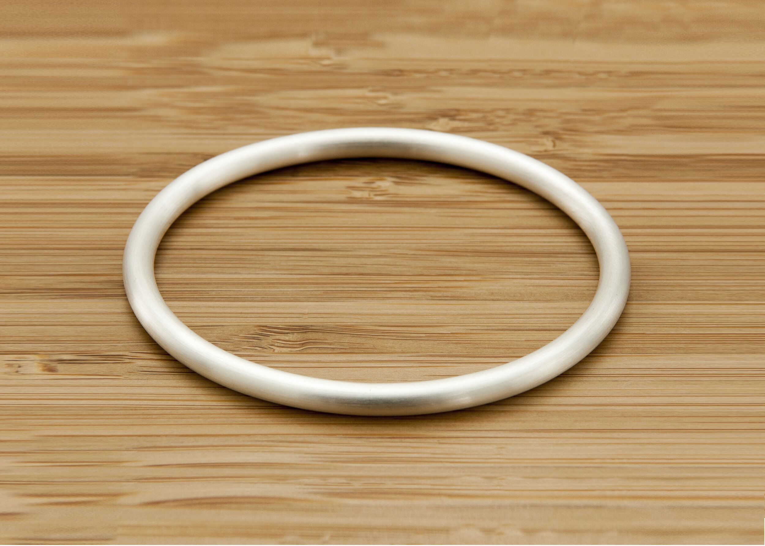 Eden 5 Oval Heavy Solid Sterling Silver Bangle 1 The Eden 5 Heavy Solid Silver Satin Oval Bangle Handmade Chunky Silver Bracelet. London Hallmarked. 5mm