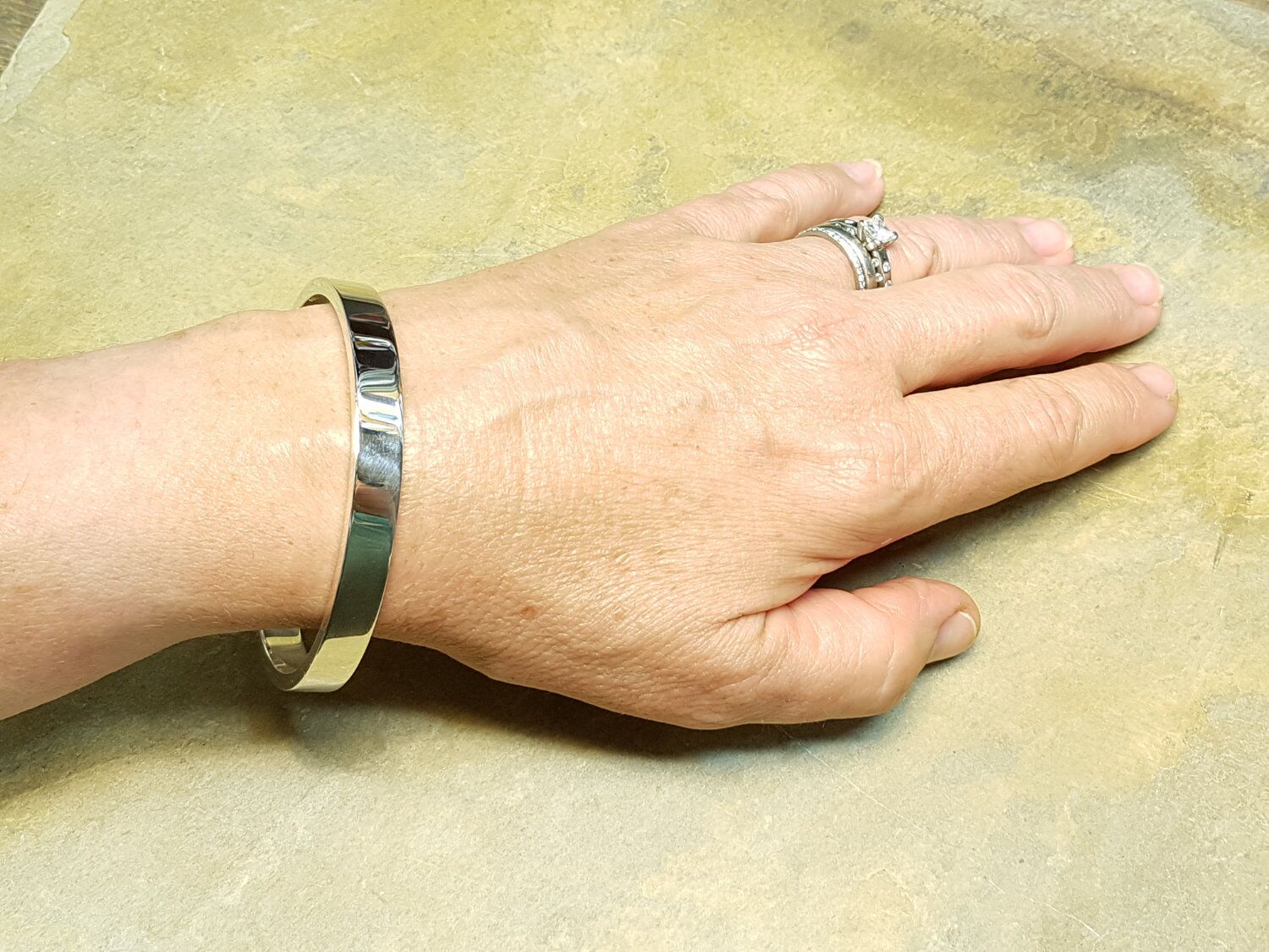 Zennor 8 Chunky Solid Sterling Silver Bangle Inside Hallmarks 2 Zennor 8 Chunky Solid Silver Bangle Bracelet, it is Handmade with outside display London Hallmarks - 8mm wide.