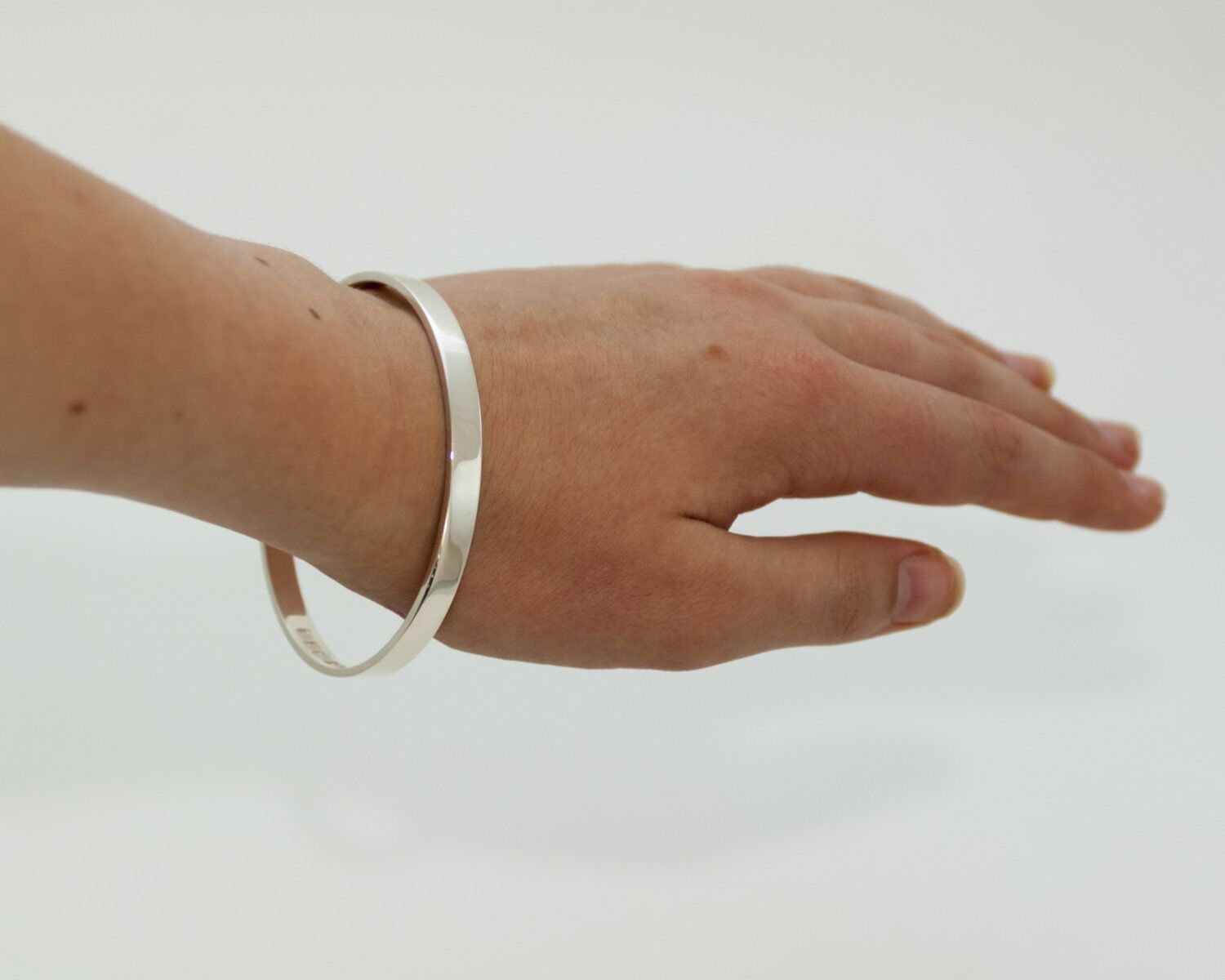 Zennor Solid Sterling Silver Bangle Inside Hallmarks 3 Zennor Solid Silver Bangle handmade in Cornwall. Solid Silver bracelet with display London Hallmarks - 6mm wide.